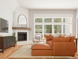 Choose chairs with casters so that they are easy to move. How To Design A Living Room With A Corner Fireplace Layout Modsy Blog