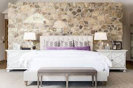 An accent wall is the feature. 25 Bedrooms That Celebrate The Textural Brilliance Of Stone Walls