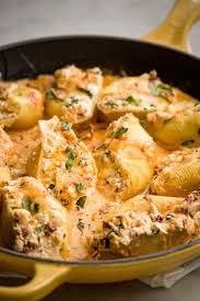 3 4 C Olive Oil Packed Sun Dried Tomatoes Finely Chopped And Dividedpreheat Oven To 350 In A Large Pot O Stuffed Shells Recipe Recipes Stuffed Pasta Shells