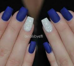 This pretty little nail art design sports a blue and white base colors with a lighter blue polish on top for the flower details and green polish for the leaves. Royal Blue Nails Blue Nails Nails Nail Designs
