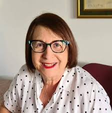 How to contact Mrs Black's family in Chiddingfold who cared for two girls  during World War II?