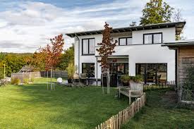 Informiere dich über neue einfamilienhaus bauhausstil garten. Bauhaus Stil Fassadenmix Holz Und Beton Winterhoff
