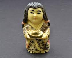 Ivory carving of a man, japan, 19th century, singing, seated with a monkey on a leash in. Bloomsbury Market Ahmoni Japanese Wealth Girl Netsuke Figurine Wayfair