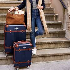 • hold in the button while you turn the dials to set your desired combination. Black Terminal 1 Checked Carry On Spinner Luggage Set Mark And Graham