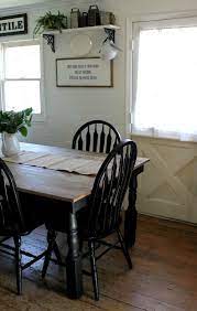 Once dry i hit the edges with a 220 grit sanding block for a lightly distressed look. Black And White Farmhouse Kitchen Update Black Kitchen Table Farmhouse Kitchen Tables White Farmhouse Kitchens