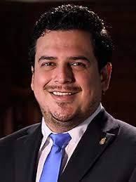 File:Retrato oficial de Rafael Eugenio Rodríguez Pellecer, Ministro de  Trabajo y Previsión Social (cropped).jpg