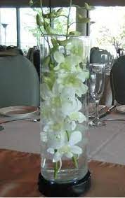 Dendrobium Orchid Centerpiece Change To Purple Orchid Centerpieces Dendrobium Orchids Centerpiece Dendrobium Orchids