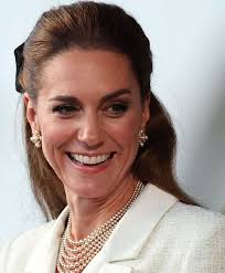 Lady of the night! Catherine caused a stir by appearing tonight for the  concert in celebration of the 80th anniversary of the VE. The real queen  was at the abbey in the