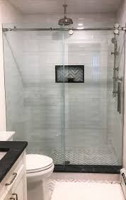 Glasstec Elite A Barndoor Style Rolling Door With A Stationary Panel Featuring Polished Stainless Steel Hardwa Glass Shower Rustic Bathroom Glass Barn Doors