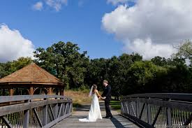 We believe in life long learning and offer learning opportunities for families and individuals of all ages! Outdoor Wedding Photo At The Eagan Community Center Outdoor Wedding Photos Wedding Poses Outdoor Wedding
