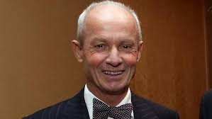 Tributes flow for James Strong