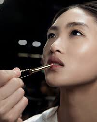 WINTER 24 Runway Look: A shiny, customizable nude hue enhances lip color.  Creative Director: Peter Hawkings Makeup Artist: Dick Page Product: New  Slim Lip Color Shine in 151 Iconic Nude #TOMFORDWINTER24