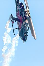 All team's planes use white smoke generators during air shows. Bell Cobra Tah 1f The Flying Bulls