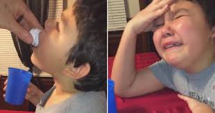 Cancer sufferer, 9, is overcome with emotion as he takes final chemo pill