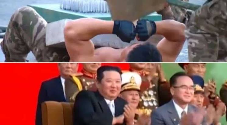 Kim Jong Un smiles and claps as soldiers lie on bed of nails