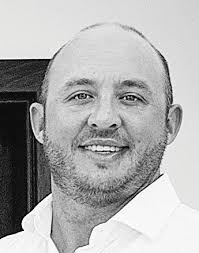 HAPPY FEET: Andrew Heath '99