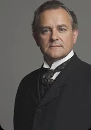 Robert Crawley, Earl of Grantham (played by Hugh Bonneville)is the  patriarch of the Crawleys and holds title to the estate of Downton Abbey  Robert Crawley he was born heir to the estate