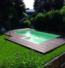 zwembad met luxe hardhouten rand en vlonder hout van gadero nl achtertuinideeen tuin zwembad terrasplanken