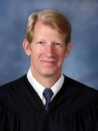 Supreme Court Justice Jeff Hughes defends handling of case that prompted  apology