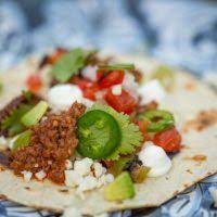 Ground Goat Tacos With Blackened Tomatoes Recipe Goat Recipes Meat Recipes Goat Meat