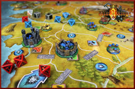A Close Up View Of Game Pieces On A Medieval Themed Map Based Game Board Game Pieces Board Games Chess Board