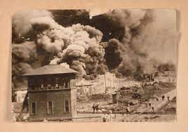 People check out a mural painted on the side of interstate 244, which cut the greenwood district in two when it was built. The Greenwood Massacre America S Single Worst Incident Of Racial Violence Is Remembered 100 Years On The Art Newspaper