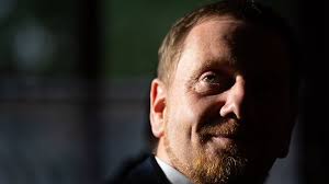 Kretschmer expects migration to ease in mid-2024