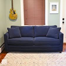 We had a little issue trying to get this through the living room door because of the narrow walkway, as you can see in the photo, the arms are rather large, we had to take one arm off, which was easy to do (also in the photo). Wayfair Custom Upholstery Sarah Sofa Bed Review Pretty And Petite