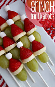 With just a little creativity and delicious recipes, these fun food recipe ideas will be sure to entertain this season! Christmas Grinch Fruit Kabobs The Bandit Lifestyle Grinch Fruit Kabobs Christmas Finger Foods Fun Christmas Food