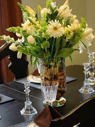The best dining room tables combine table linens, serveware, tableware, and other fun accents to make an attractive looking dining room. Dining Room Table Flower Arrangement Wild Country Fine Arts