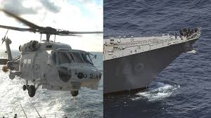 Japan military helicopter crash: 1 dead, 7 missing, defence minister says