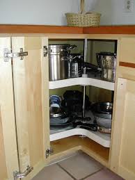 Instead of wasted corner counter space, this kitchen cabinet design features an extra drawer for utensils. Kitchen Corner Idea Smart Trik