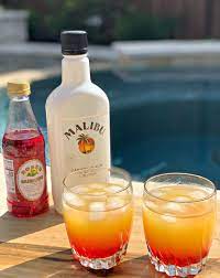This easy to make, tasty cocktail combines coconut rum, pineapple, and sweet grenadine! Malibu Sunset Cocktails The Cookin Chicks