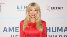 Christie Brinkley Shows Off Her Silly Side, Wades in Clear Blue ...
