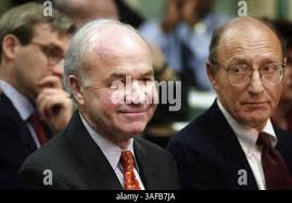 Former Enron chairman Kenneth Lay, left, greets supporter Lee Perry