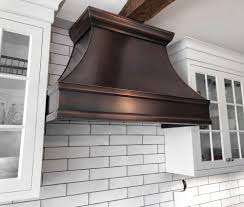 Our range's user manual stated that the bottom surface of any range hood or upper cabinetry had to be at least 24 inches away from the stove top surface. Berenice Range Hood Art Of Range Hoods Made In The Usa