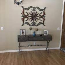 Champagne color finished metal complements the antiqued gray finished wood. Quinnland Sofa Console Table Ashley Furniture Homestore