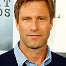 The polo black by Greg (Aaron Eckhart) in The Romanoffs