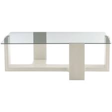 Coffee table with an industrial style due to the four big wheels recycled from a massive industry machine. Bernhardt Vesper 626137980 Contemporary Cocktail Table With Glass Table Top Baer S Furniture Cocktail Coffee Tables