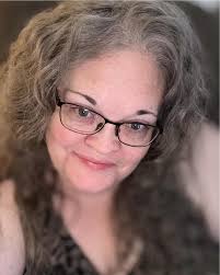 Looking for some ideas! My 11year old cousin is going to be in my wedding  but I'm in a debate about what to have her do. Should I have her be a