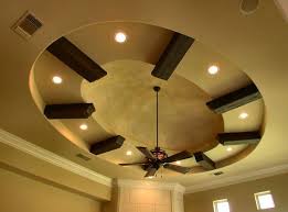 Unique Oval Dome Uplighted With Rustic Timber Look Out Beams Ceiling Design Living Room False Ceiling Design Ceiling Design