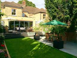 When getting started, the question is clear: Modern Landscaped Garden With An Extension On An A Traditional Edwardian Double Fronted Semi Detached House Garden Design Detached House Garden Planning