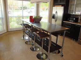 Kitchen Island Table We Ve Had This For A Few Years And This Is Where Everyone Usually Hang Metal Kitchen Island Kitchen Design Stainless Steel Kitchen Island