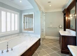Wood floors in the bathroom, once considered impractical, are now often a realistic choice, thanks to modern materials and sealers. Grey Wood Floor Bathroom Ideas Houzz