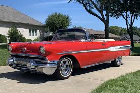 Image result for Starlight Yellow 1957 Pontiac