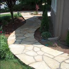 This involves excavating the area, adding stone and sand and grading. Flagstone Slate And Other Stone Walkway Ideas