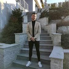 There is a wooden panel, giving a contrast with the door's dark coloring. Cristiano Ronaldo S Italian Home Is Better Than Any Hotel Hello