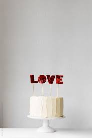 Affordable and search from millions of royalty free images, photos and vectors. Love Cake By Ruth Black For Stocksy United Love Cake Cake Background Valentines Cakes And Cupcakes