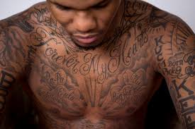 Tattoos and tattoo removal services.find tattoo services in another area. Skin Deep Athletes Quarterly