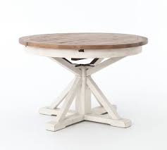 This is a table that would take a larger kitchen or dining area. Hart Round Reclaimed Wood Pedestal Extending Dining Table Expandable Round Dining Table Round Extendable Dining Table Round Dining Table